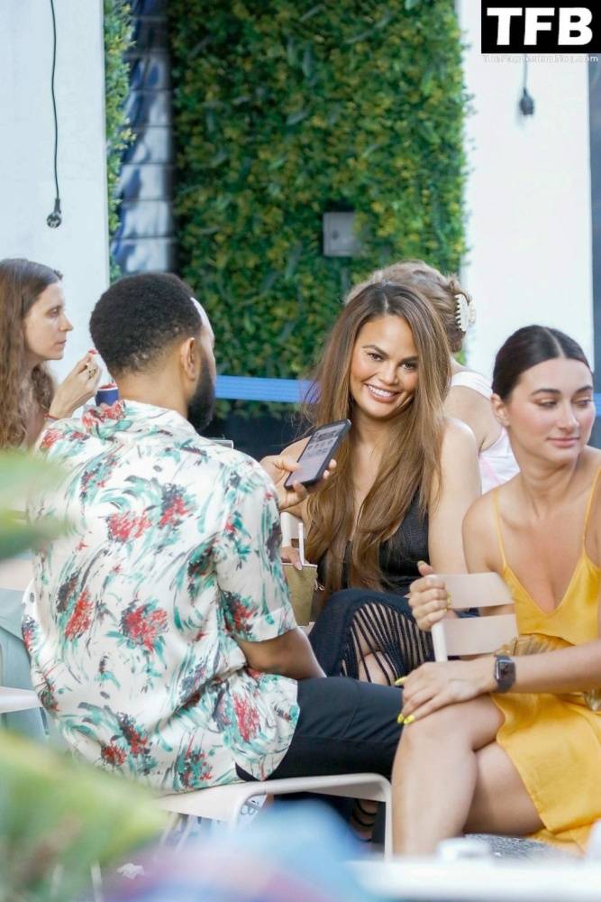 Chrissy Teigen Goes Braless Under a Very Sexy Sheer Black Dress in France - #13