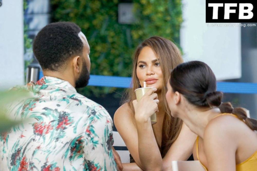 Chrissy Teigen Goes Braless Under a Very Sexy Sheer Black Dress in France - #5