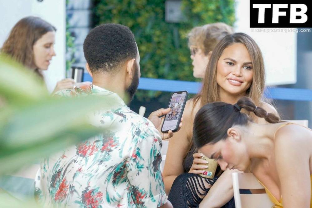 Chrissy Teigen Goes Braless Under a Very Sexy Sheer Black Dress in France - #3