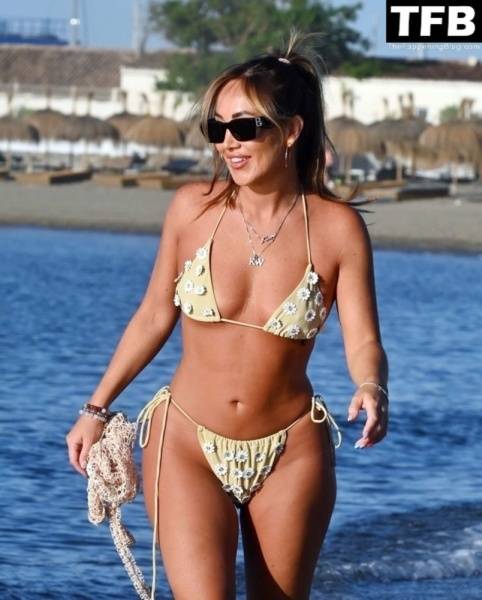 Lauryn Goodman Shows Off Her Sexy Bikini Body on the Beach in Marbella on solefans.net