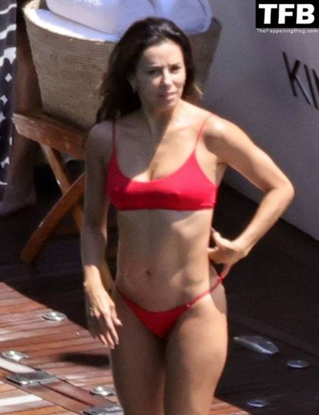 Eva Longoria Showcases Her Stunning Figure and Ass Crack in a Red Bikini on Holiday in Capri on solefans.net