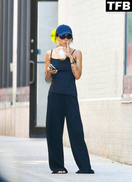 Braless Zoe Kravitz is Spotted Taking a Smoke Break in NYC on solefans.net