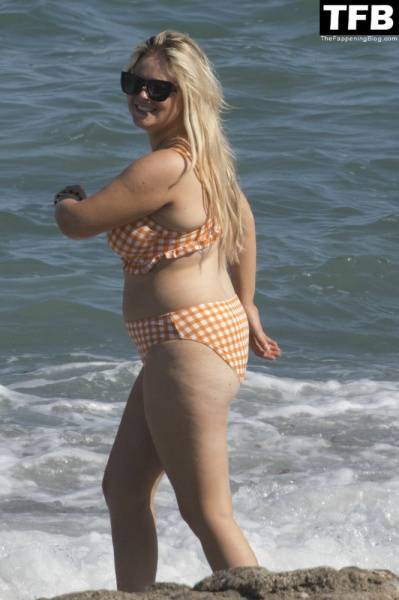 Emily Atack is Seen Having Fun by the Sea and Doing a Shoot on Holiday in Spain - Spain on solefans.net