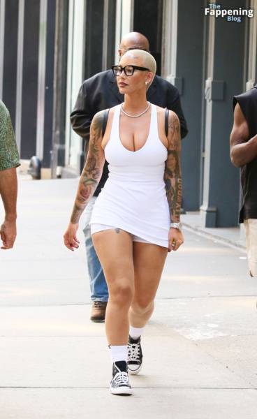 Amber Rose Turns Heads in a Revealing White Mini Dress During SoHo Outing (39 Photos) on solefans.net